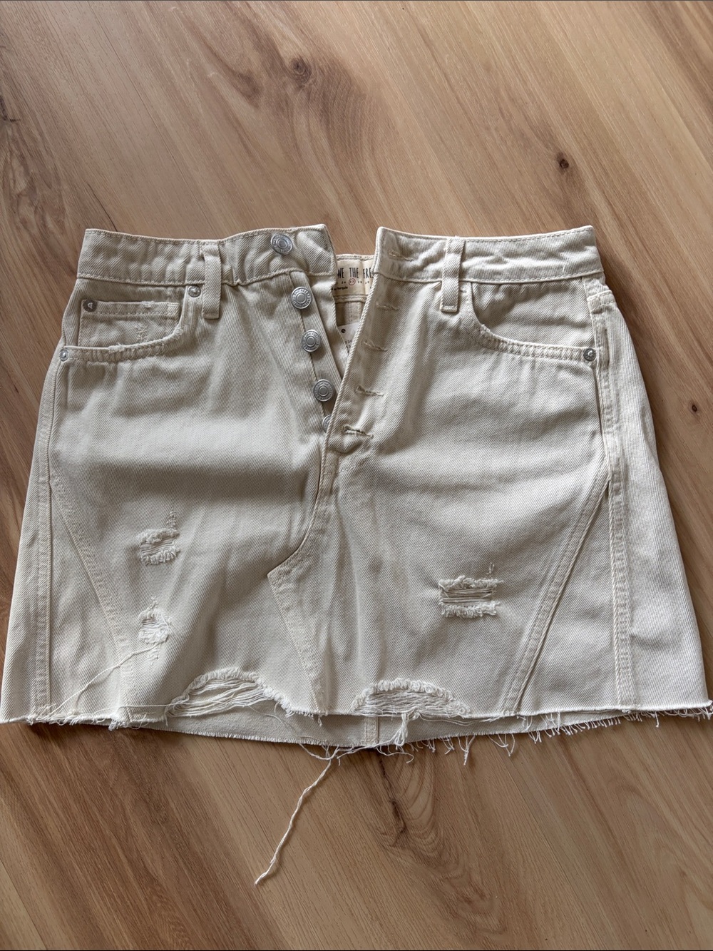 NWT We The Free Distressed Cream Denim Mini Skirt
